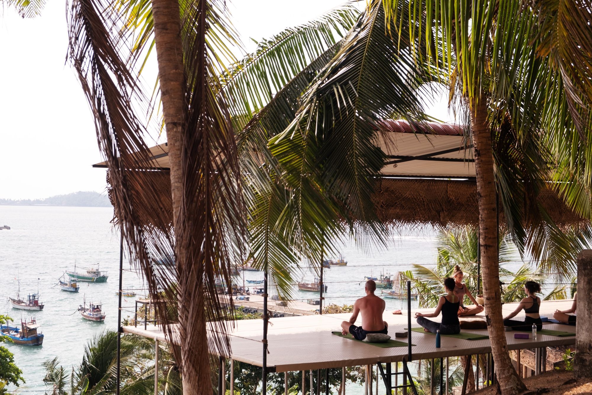Morning meditation on the shala deck above Weligama harbour